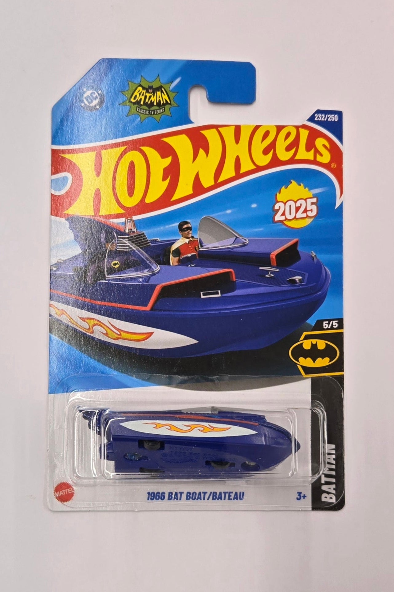 Hot Wheels toy car packaging on a white card with a blue background