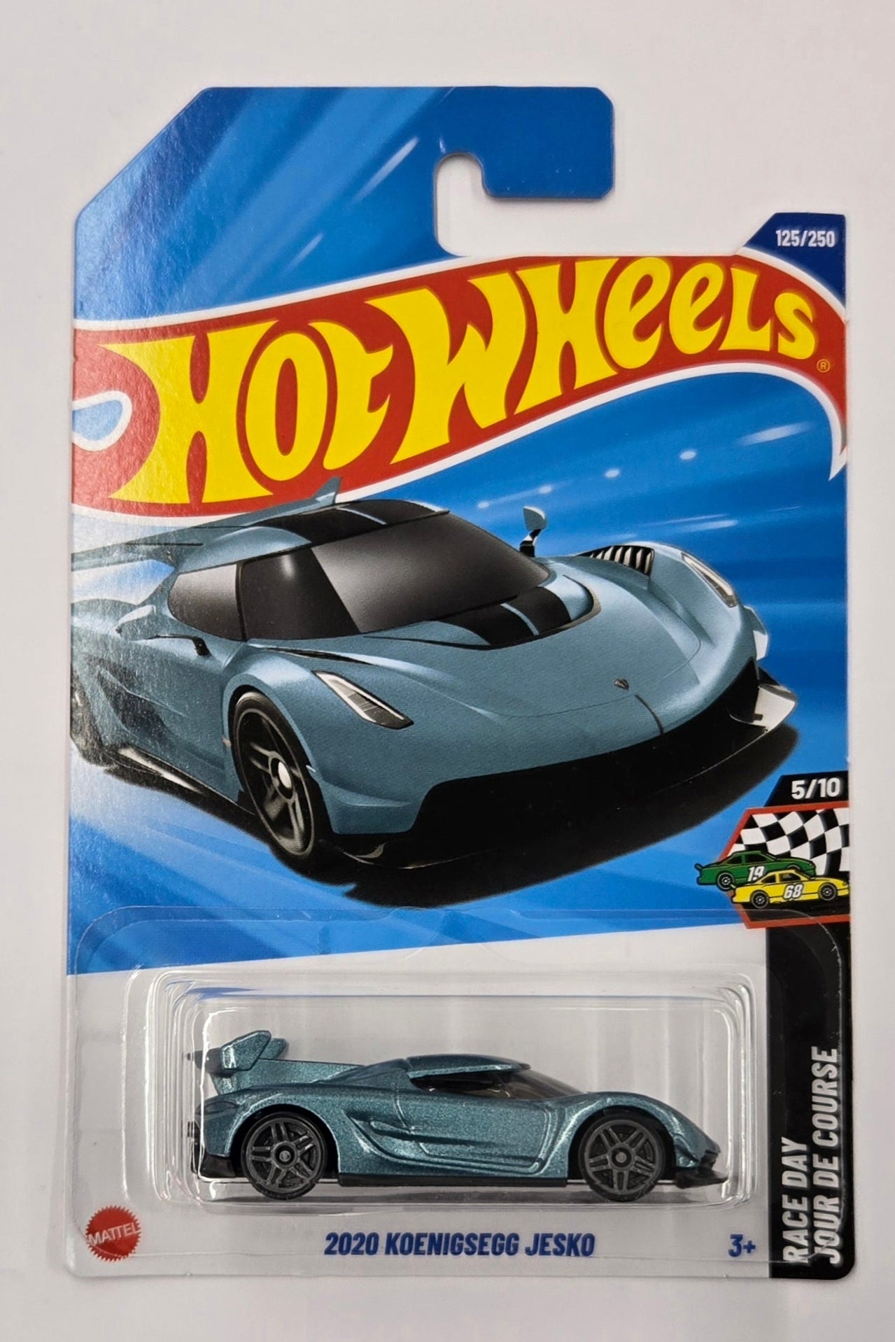 Hot Wheels toy car packaging with a blue and red design on a white background