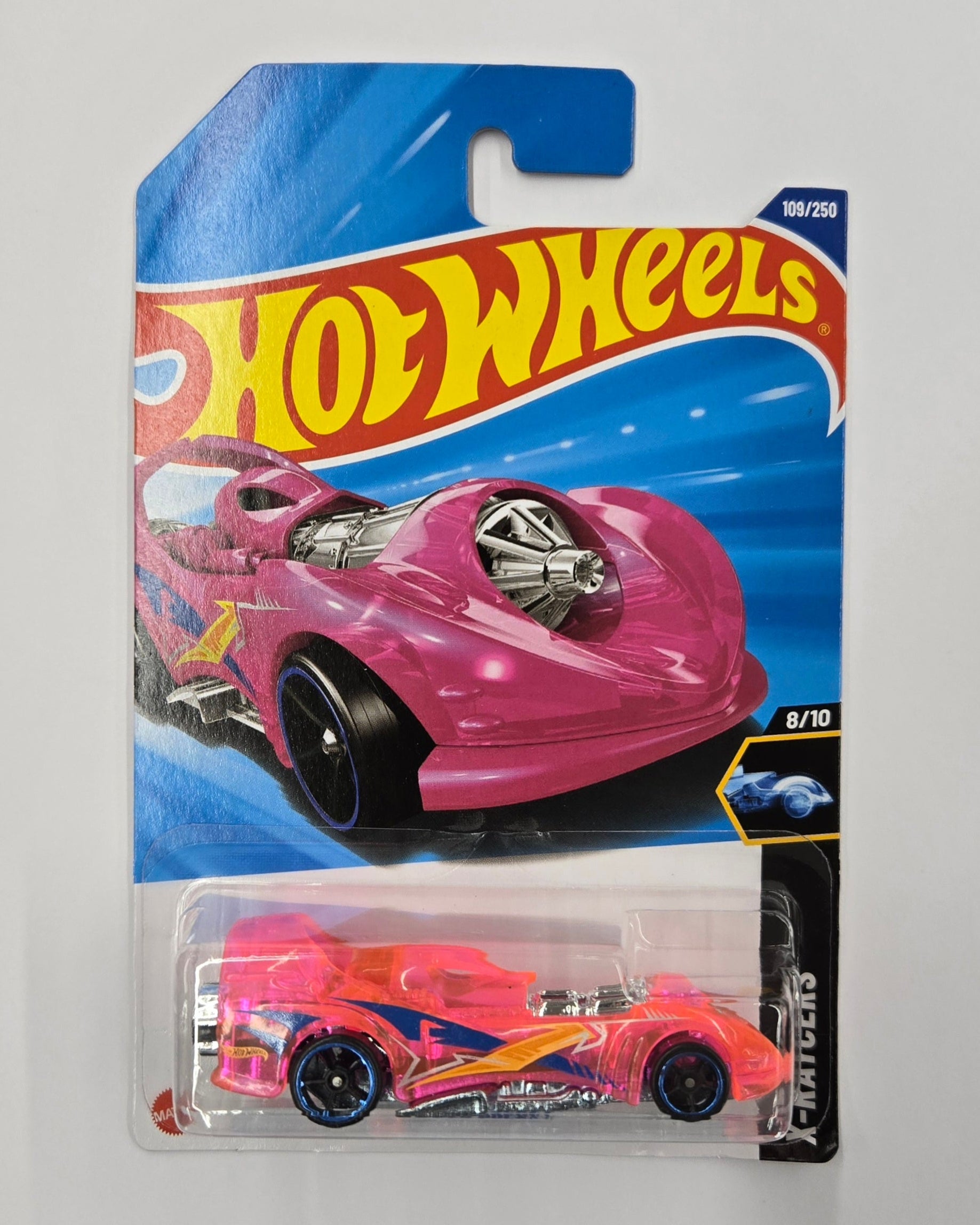 Hot Wheels pink car in packaging on a white background