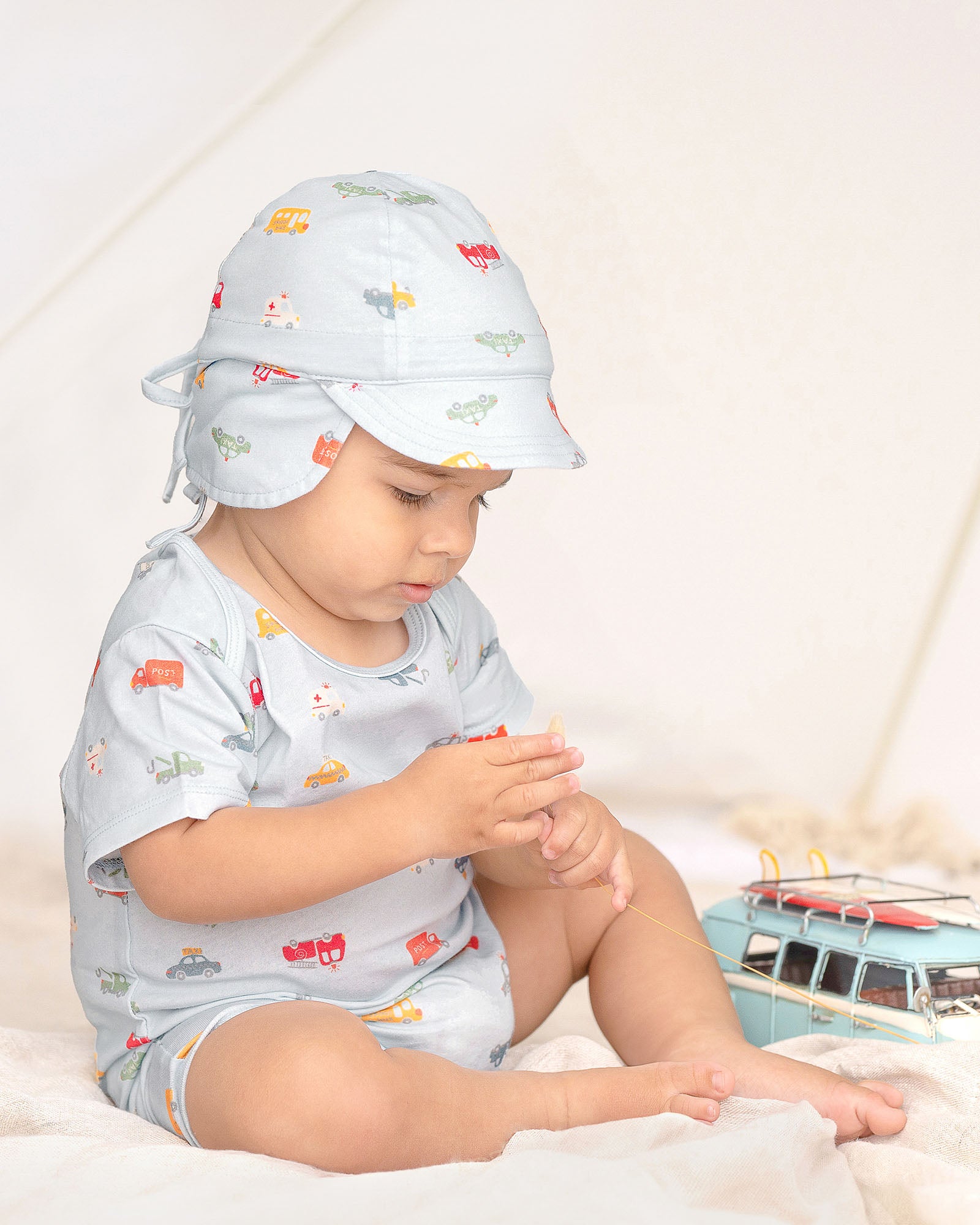 Toshi Flap Cap Bambini | Working Wheels