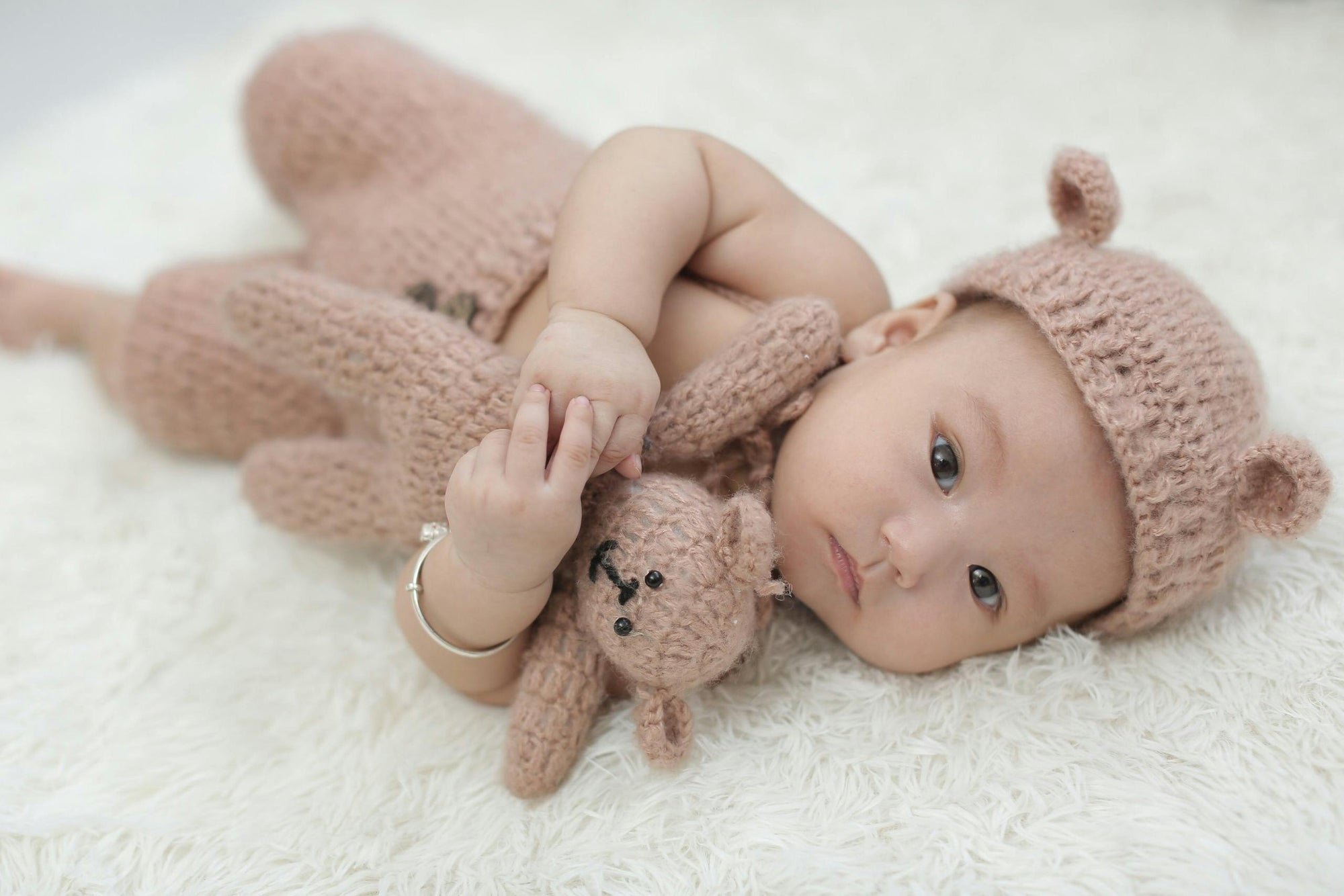 Baby Holding Soft Toy