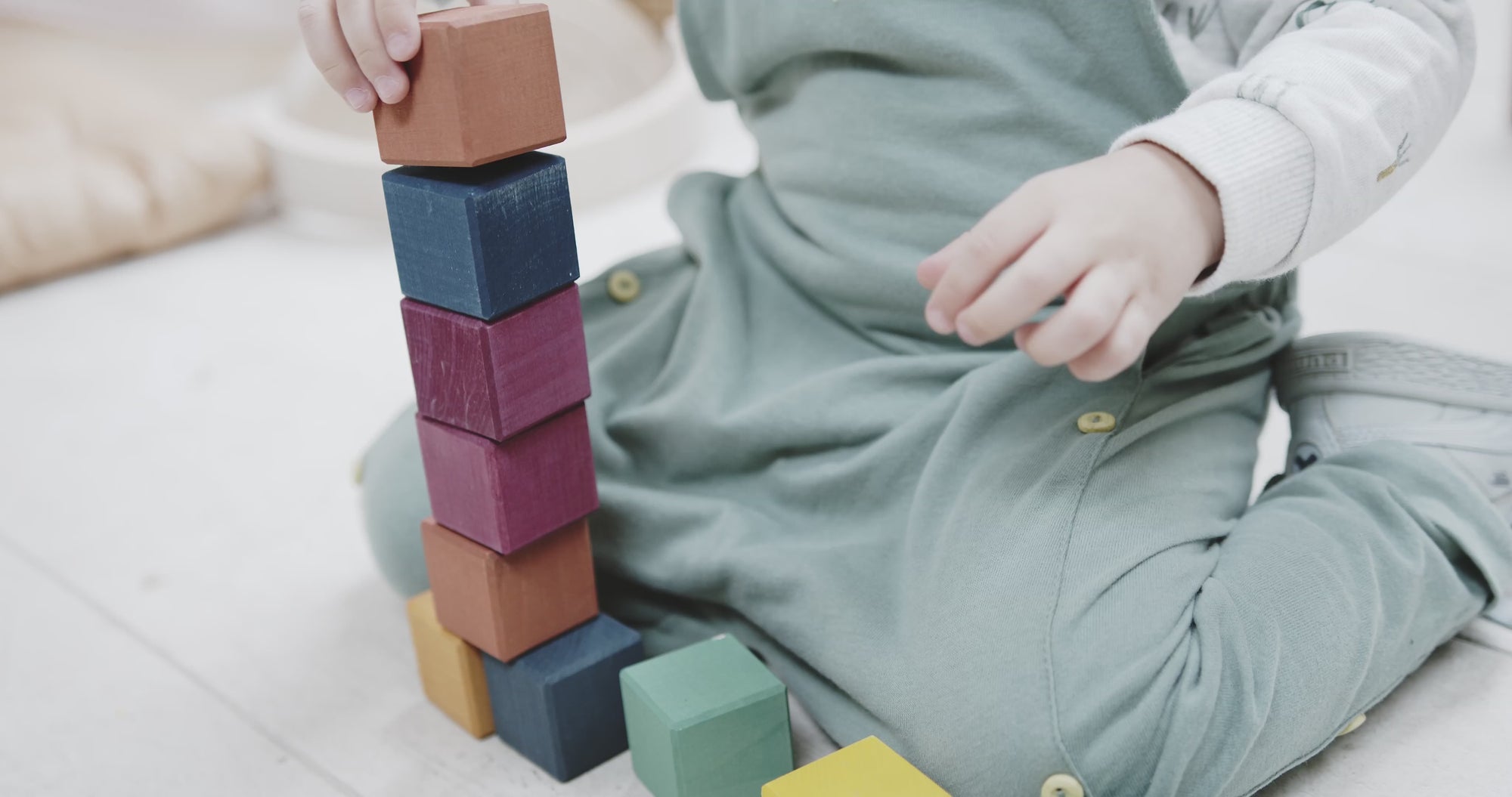 Baby Playing with Blocks